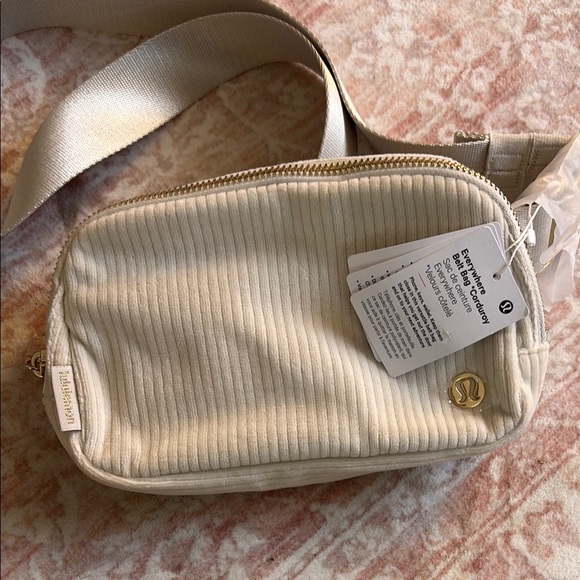 Lululemon Athletica Cream Wristlet with Ribbed Texture - Picture 1 of 1